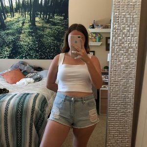 Light wash shorts with distressing